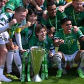 Celtic player Kyogo Furuhashi (front centre) and teammates with the league winners trophy after the Cinch Scottish Premiership match between Celtic FC v St Mirren at Celtic Park Stadium on May 18, 2024