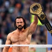 Drew McIntyre reacts after defeating Seth "Freakin" Rollins to win the WWE World Heavyweight Championship 
