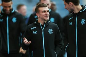 Turkish defender Ridvan Yilmaz of Rangers is a wanted man in his homeland