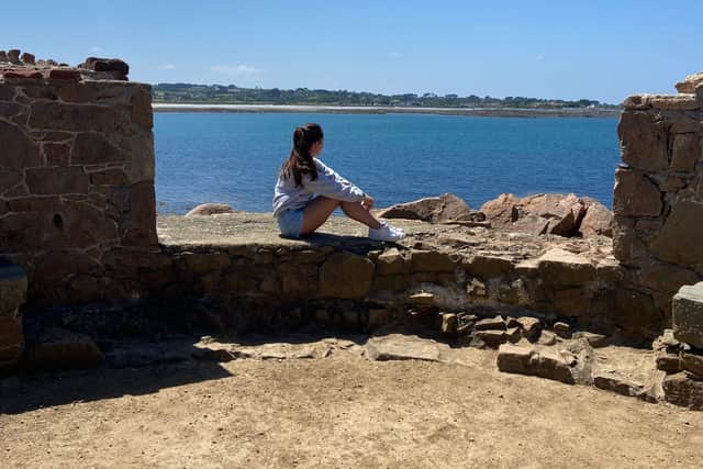 Exploring Fort Hommet, a Victorian fortification on Vazon Bay headland. (Photo: Isabella Boneham)