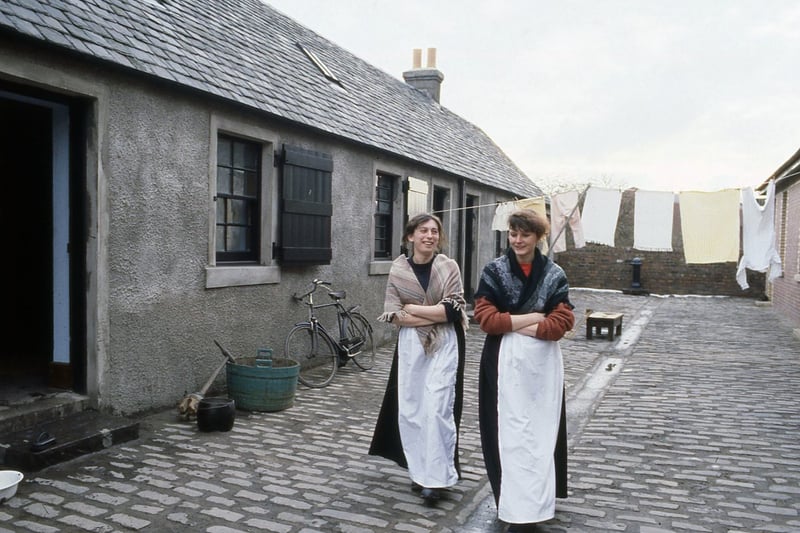 Staff members Lisa and Carol Ann outside the miners' rows, around 1990.
