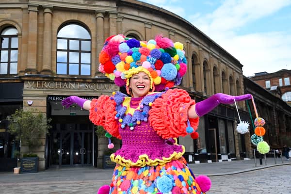 The Prom Pom Queen is pictured at the Merchant Square to promote the The Merchant City Festival.