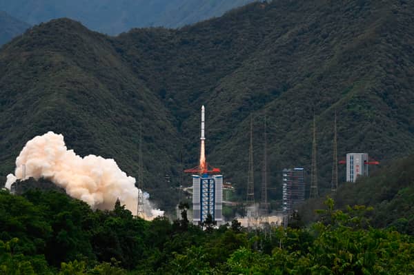 A rocket successfully lifts off from a space base in Xichang, in China's southwestern Sichuan province on June 22, 2024. (Photo by ADEK BERRY/AFP via Getty Images)