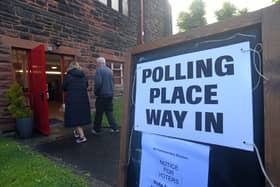 People arrived early to cast their votes during the general election at Pollokshields Burgh Hall. 
