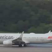 Boeing 737’s tyre explodes, flinging rubber across the runway.