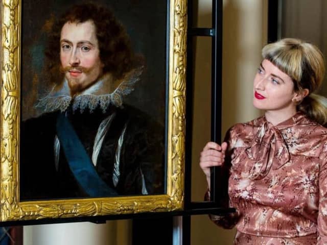 Glasgow Museums curator Pippa Stephenson admires the previously "lost" Rubens masterpiece in Pollok House.