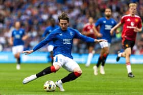 Rangers' Scott Wright has a shot during a pre-season friendly match against Manchester United