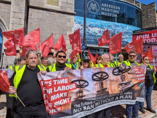 Works showing their support outside Aberdeen Maritime Museum