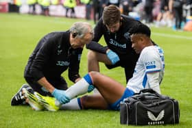 Rangers' Oscar Cortes gets treatment for an injury from which he was unable to continue