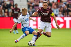 Hearts' Lawrence Shankland and Rangers' Connor Barron in action