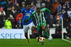 Rangers midfielder Jose Cifuentes (L) vies with Aris Limassol midfielder Mihlali Mayambela