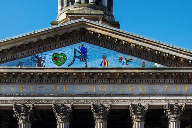 The Gallery of Modern Art features a mirror mosaic which sits above the entrance on the outside of the building that depicts the story of Saint Mungo.