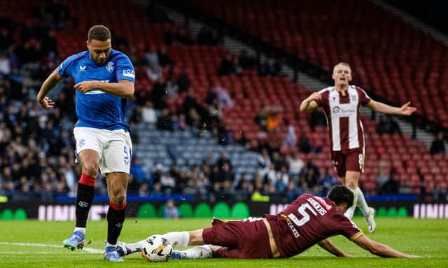 Cyriel Dessers scored the opener for Rangers after this incident with Jack Sanders.