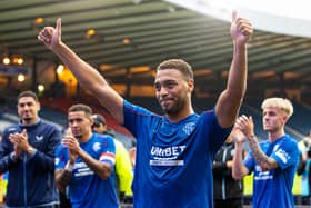Rangers' Cyriel Dessers celebrates at full time.