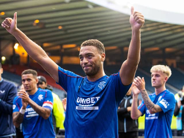 Rangers' Cyriel Dessers celebrates at full time.