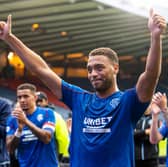 Rangers' Cyriel Dessers celebrates at full time.