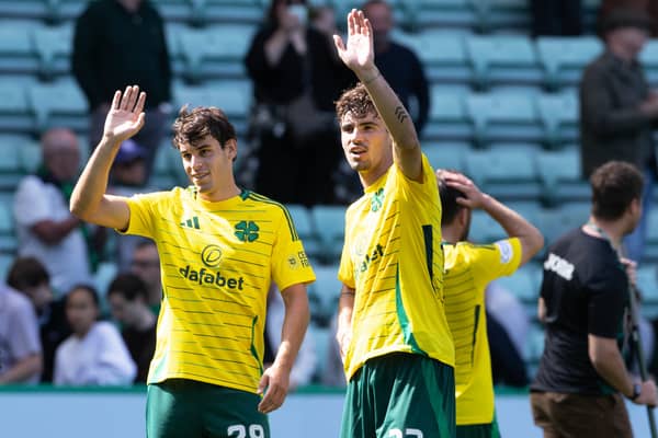 Celtic's Paulo Bernardo and Matt O'Riley wave to fans at Easter Road