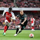  Eddie Nketiah of Arsenal battles for possession with Gustavo Puerta of Bayer 04 Leverkusen