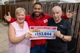 Geraldine and husband Paul with lottery ambassador Danyl Johnson
