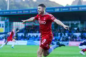 Kevin Nisbet was the star of the show as Aberdeen secured a last gasp victory against Ross County.