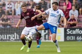 Hearts' Blair Spittal and Rangers' John Souttar in action