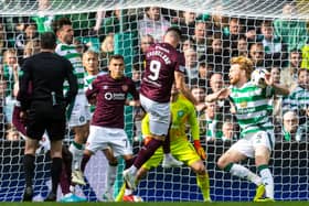 Celtic's Liam Scales is penalised for a handball in the penalty box 