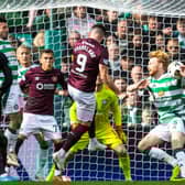 Celtic's Liam Scales is penalised for a handball in the penalty box 