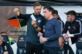 Scott Brown and his assistant Steven Whittaker have signed new deals at Ayr United.