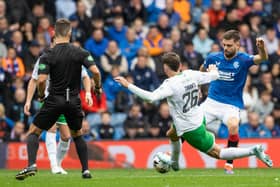 Hibs' Nectar Triantis fouls Rangers' Robin Propper
