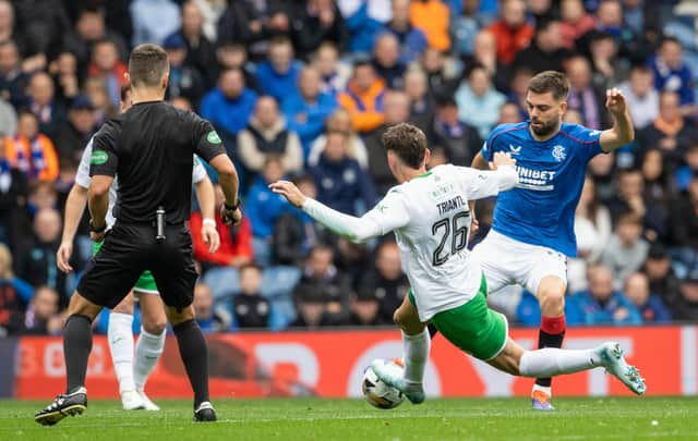 Hibs' Nectar Triantis fouls Rangers' Robin Propper