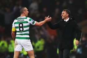 Scott Brown often turns to former boss Brendan Rodgers for advise in management.