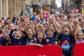 A long-standing tradition of Super Saturday is the action-packed Mascot race, a brilliant opportunity for local charities and sports teams to get involved in the competitive spirit whilst adding to the entertainment on offer to runners and spectators in George Square. 