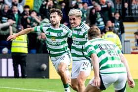 Celtic's Nicolas Kuhn celebrates after scoring to make it 2-1 against Ross County in Dingwall