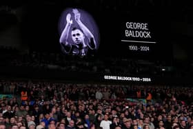 A tribute to George Baldock on the big screen ahead of the UEFA Nations League Group B2 match at Wembley Stadium, London.   Adam Davy/PA Wire.
