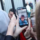 Portugal's Cristiano Ronaldo signs autographs for fans
