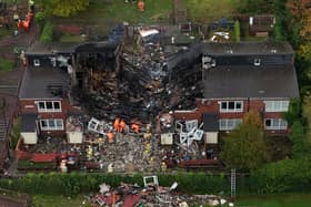 Three adults and one child have been rushed to hospital after a large fire destroyed a house in Newcastle. 
