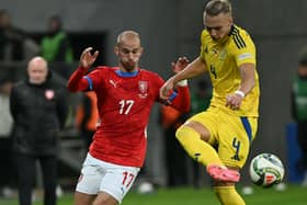 Czech Republic midfielder Vaclav Cerny (L)and Ukraine defender Maksym Talovierov vie for the ball during a Nations League clash at the Tarczynski Arena in Warsaw