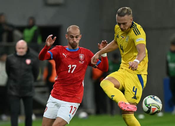 Czech Republic midfielder Vaclav Cerny (L)and Ukraine defender Maksym Talovierov vie for the ball during a Nations League clash at the Tarczynski Arena in Warsaw