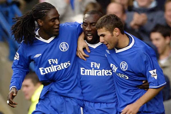 Chelsea's Jimmy Floyd Hasselbaink (C) celebrates with teammates Adrain Mutu (R) and Mario Melchiot (L)
