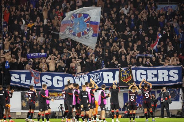 Rangers' players celebrate with supporters after the win over Malmo in Sweden