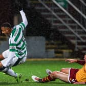 Motherwell defender Liam Gordon tackles Celtic striker Adam Idah which resulted in a red card after a VAR check. (Photo by Craig Williamson / SNS Group)