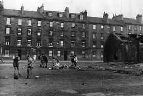An open site which children in the Gorbals area of Glasgow use for playing.