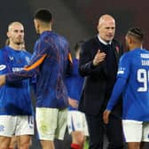Philippe Clement, Head Coach of Rangers interacts with Danilo after the full-time whistle