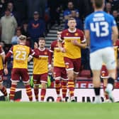 Andy Halliday of Motherwell celebrates scoring his team's first goal with teammates