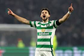 Kuhn roars on the Celtic crowd after his goal.
