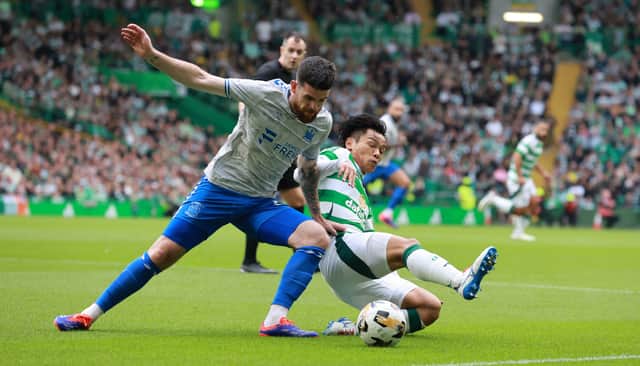 Reo Hatate of Celtic and Liam Donnelly of Kilmarnock