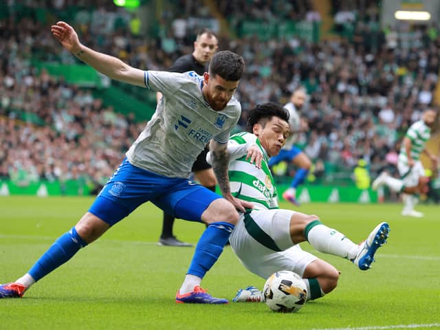 Reo Hatate of Celtic and Liam Donnelly of Kilmarnock 