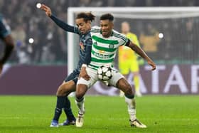 Auston Trusty battles for the ball with Yussuf Poulsen