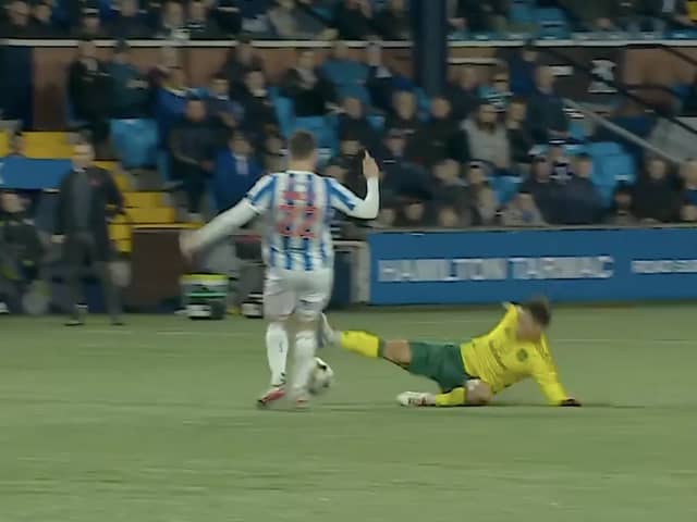 Celtic's Reo Hatate walked away with only a yellow card for this challenge on Kilmarnock's Liam Donnelly