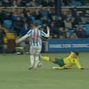 Celtic's Reo Hatate walked away with only a yellow card for this challenge on Kilmarnock's Liam Donnelly